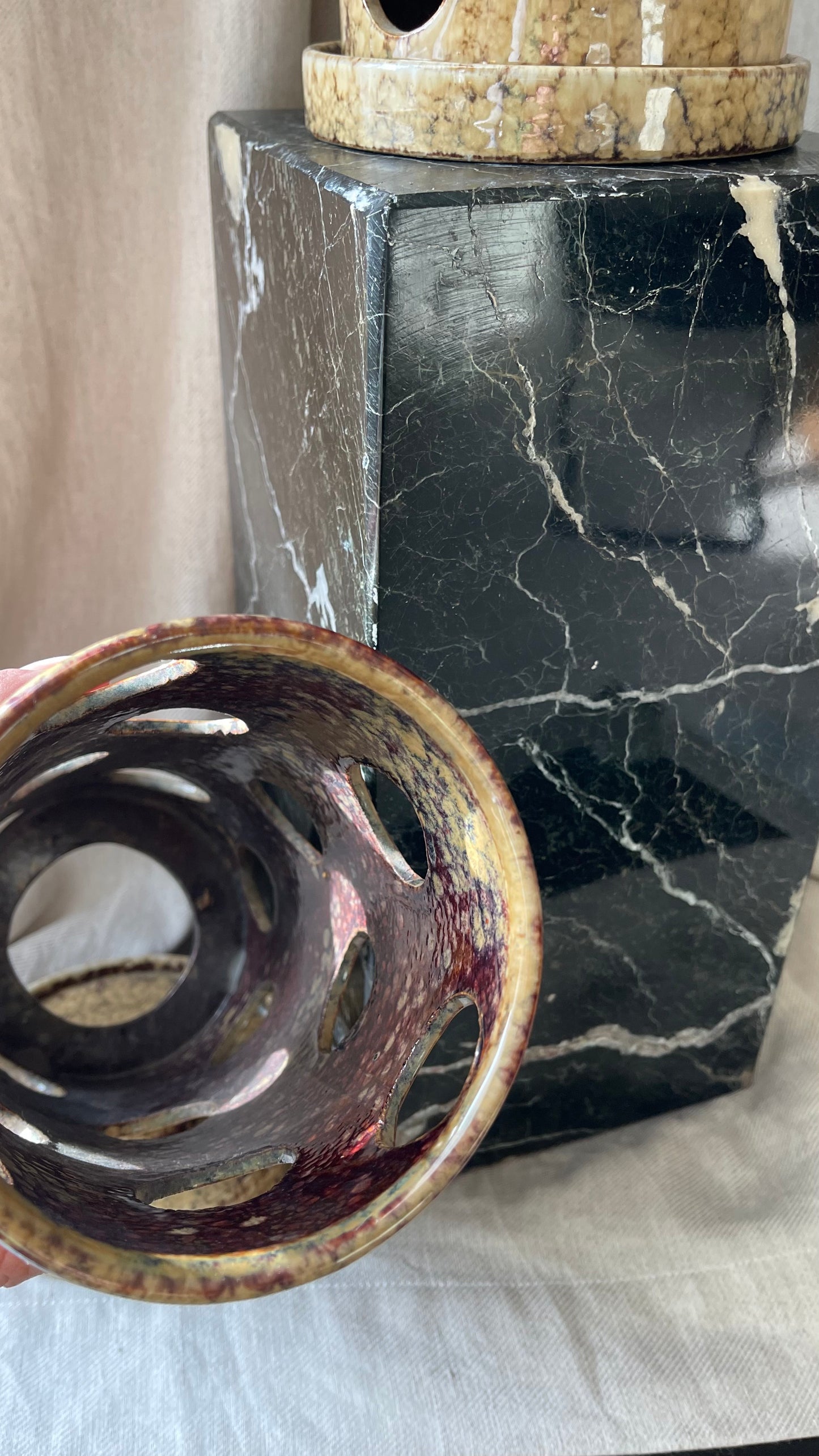 A large pair of ceramic tea light holders