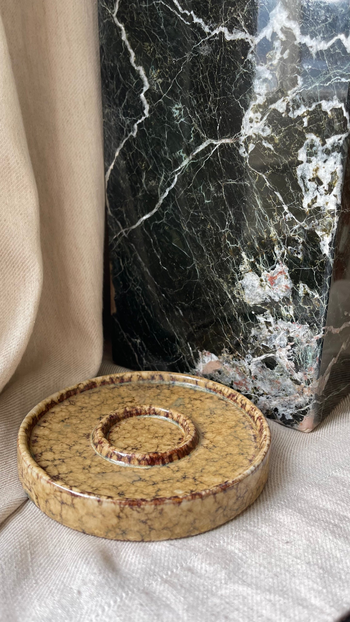 A large pair of ceramic tea light holders
