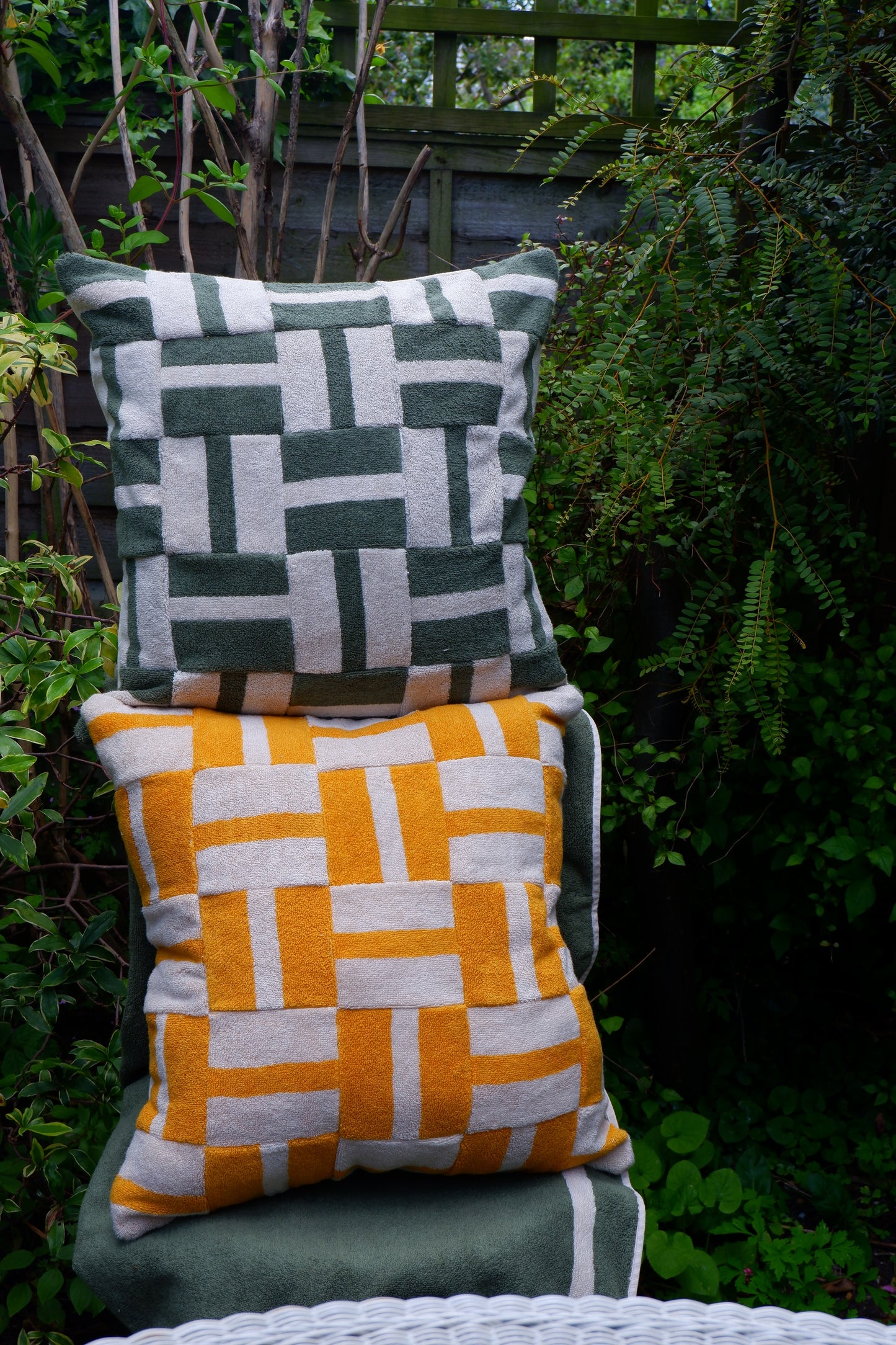 Geometric yellow towelling cushion