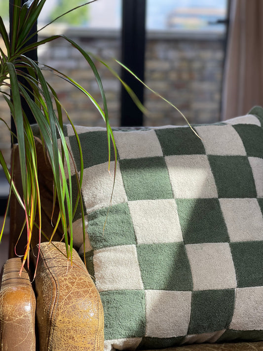 Green chequered towelling cushion