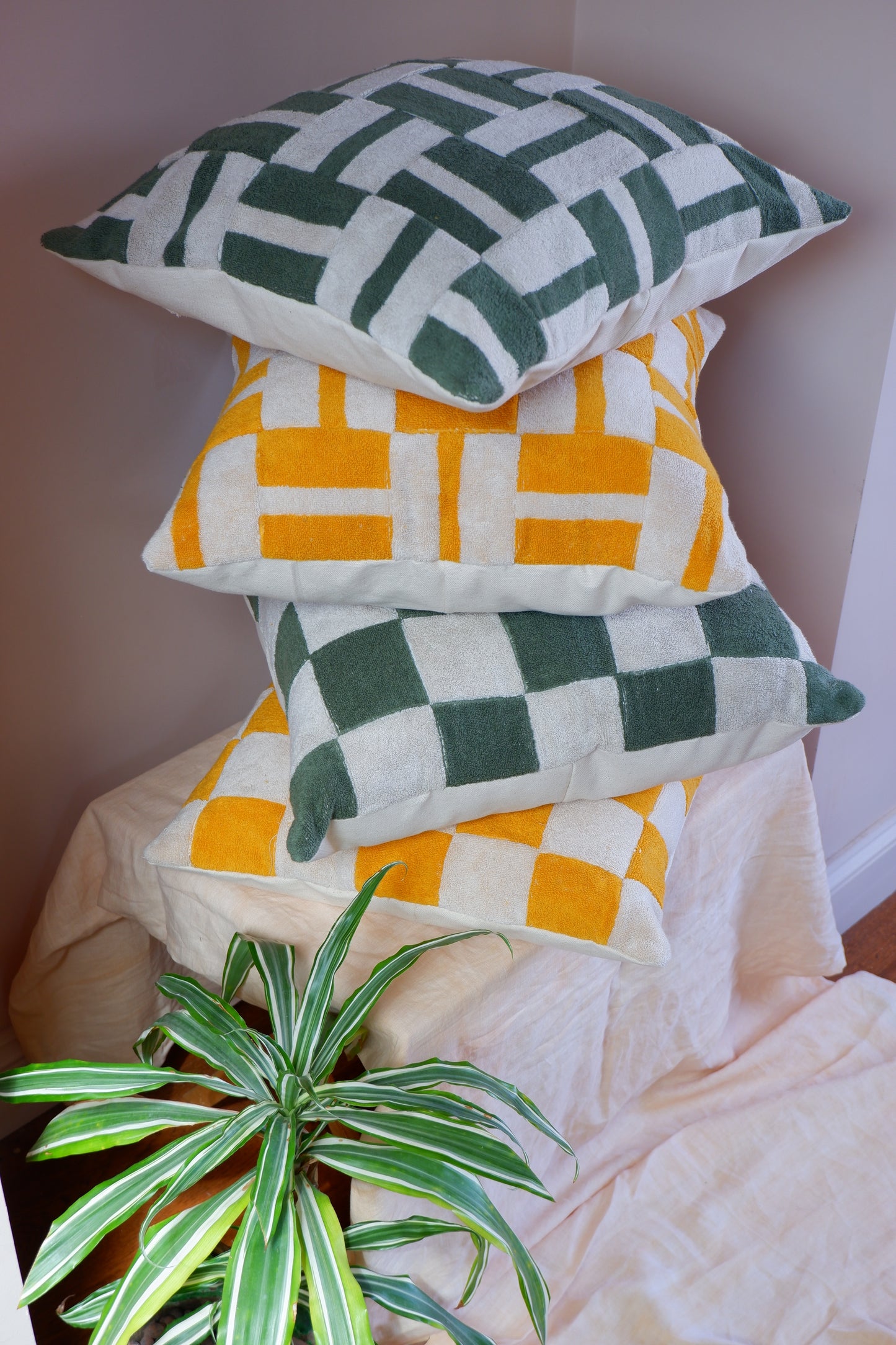 Geometric green towelling cushion