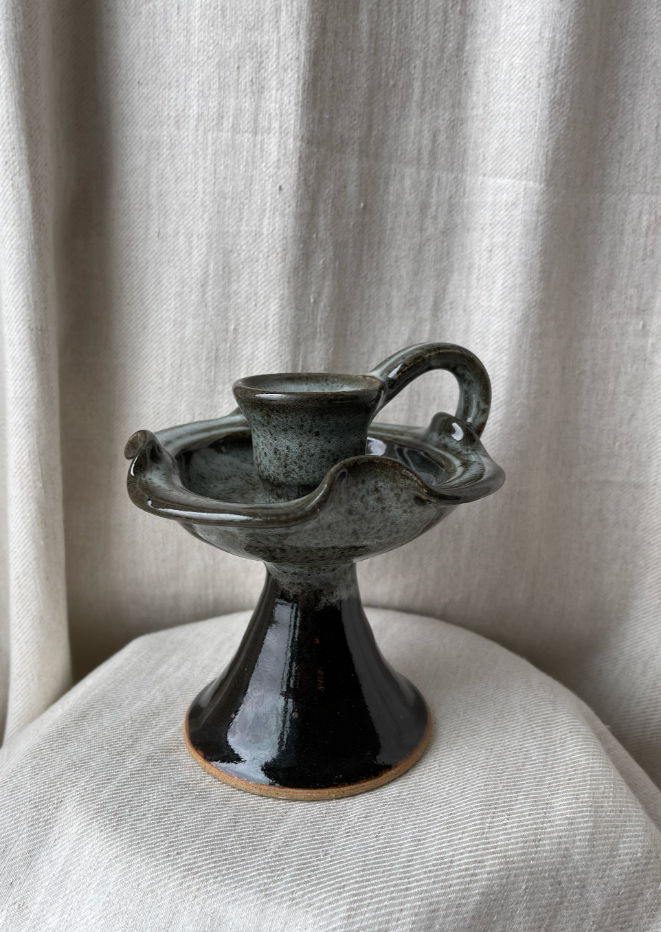 Wavy vintage pottery candlestick