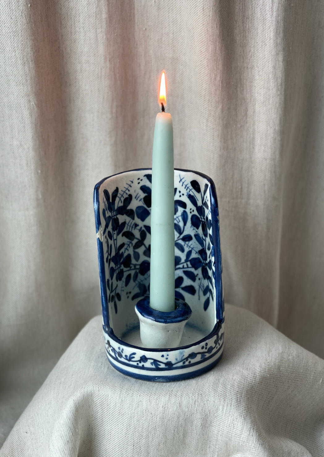 White and blue candle stick holder