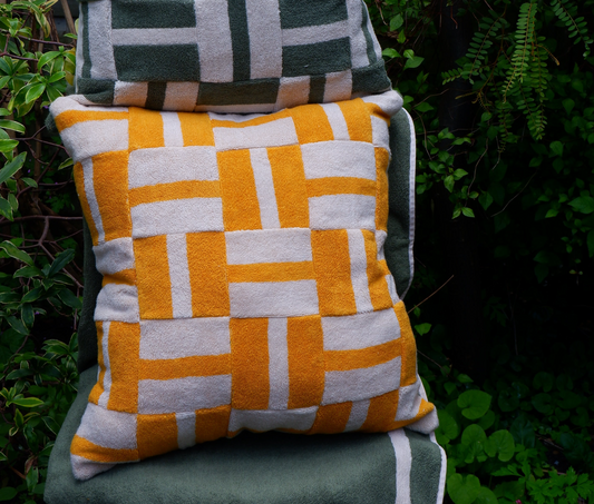 Geometric yellow towelling cushion