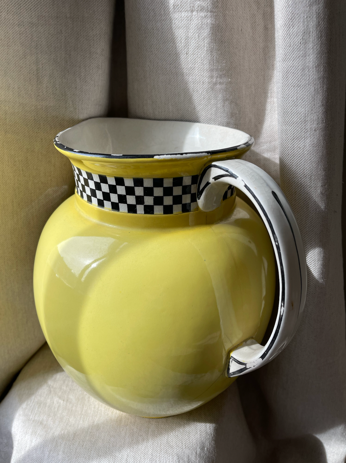 Yellow and chequerboard sun jug