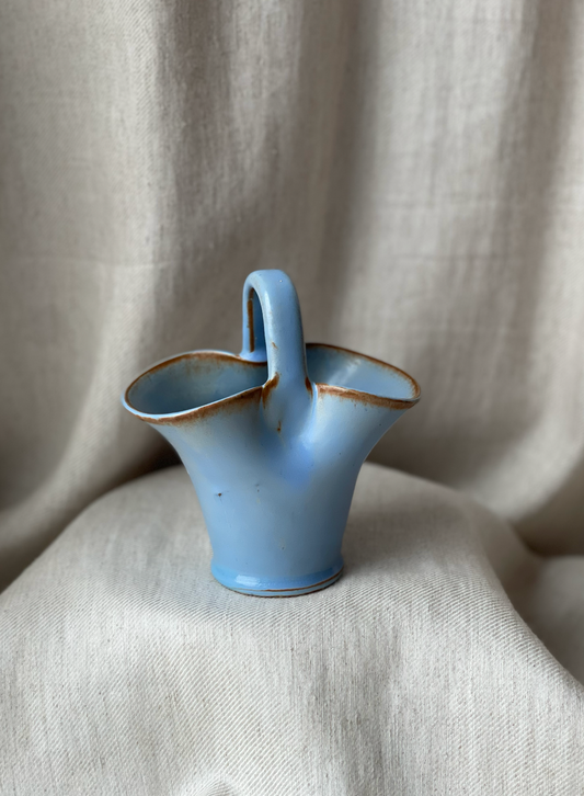 Blue ceramic handbag style basket holder