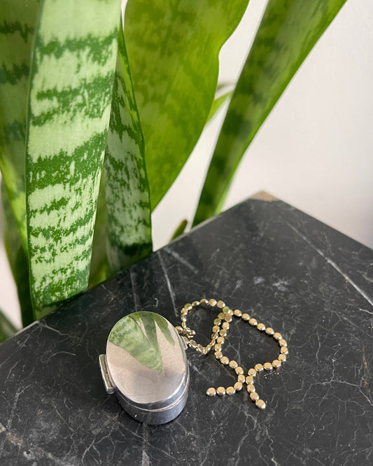 Silver oval pill box